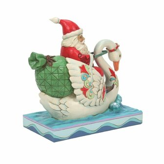 jim shore santa riding swan
